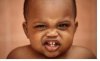 african-american-baby-with-cool-facial-expression-bellyitchblog-com1.jpg